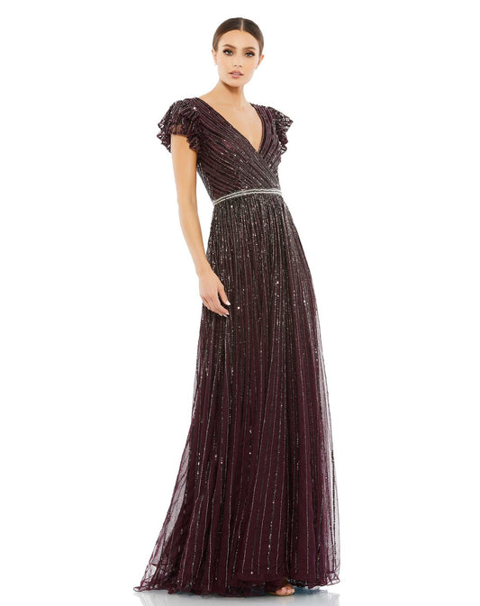 Sequined wrap over ruffled cap sleeved gown